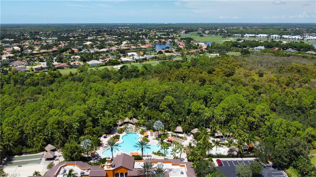 9067 Capistrano Street North, Unit 4503 Naples, FL 34113 - Photo 32 of 41 an aerial view of multiple house