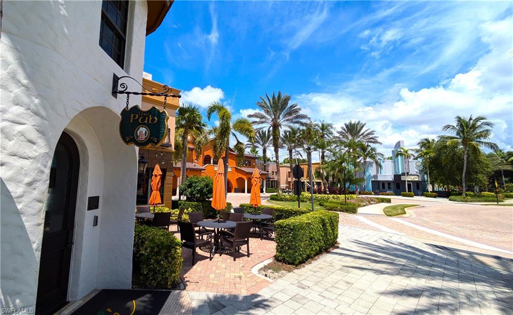 9067 Capistrano Street North, Unit 4503 Naples, FL 34113 - Photo 35 of 41 a view of outdoor space yard and patio