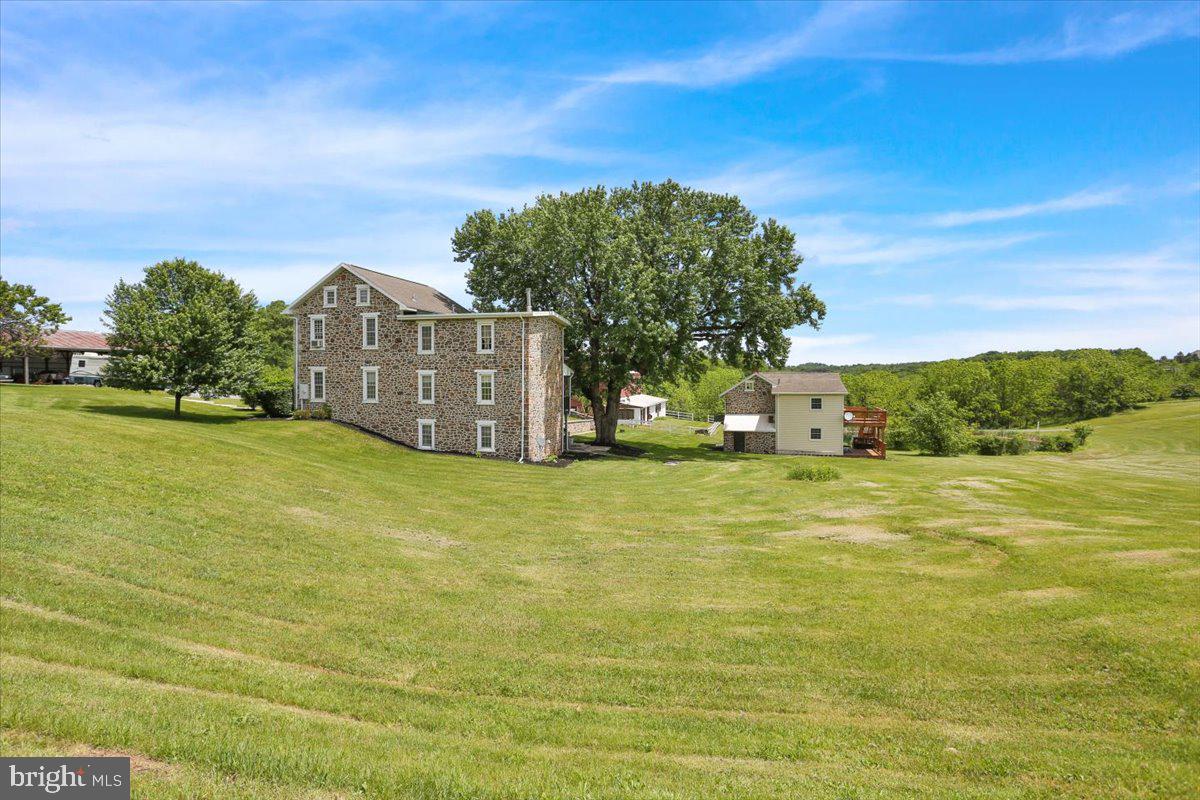 739 Boar Road Mohrsville, PA 19541 - Photo 11 of 98 a view of a large body of water with a building in the background