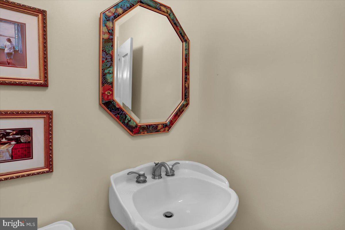 739 Boar Road Mohrsville, PA 19541 - Photo 21 of 98 a bathroom with a sink and a mirror