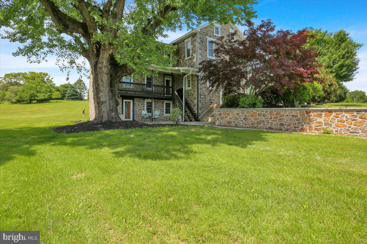 739 Boar Road Mohrsville, PA 19541 - Photo 6 of 98 a view of a house with a big yard