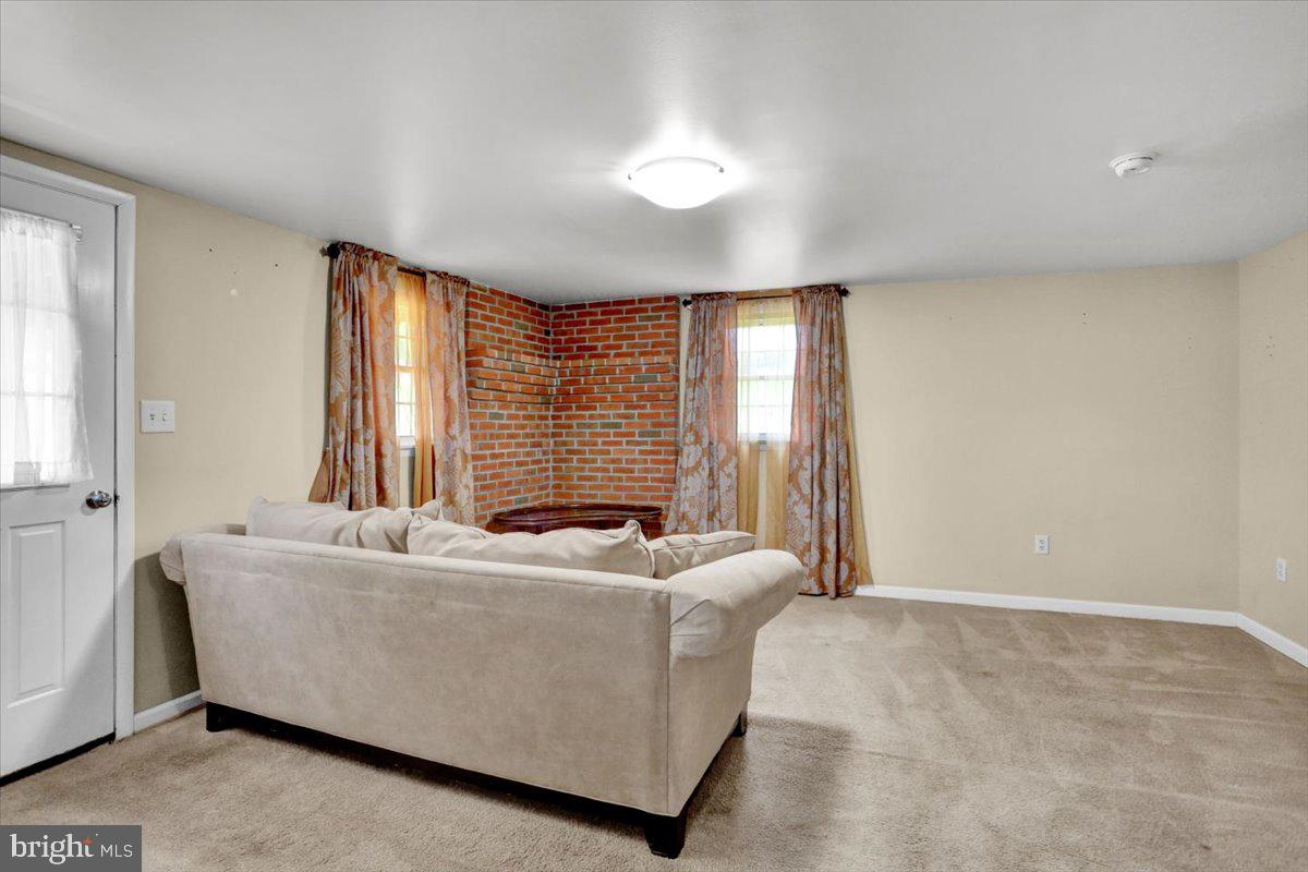 739 Boar Road Mohrsville, PA 19541 - Photo 69 of 98 a living room with furniture and a large window