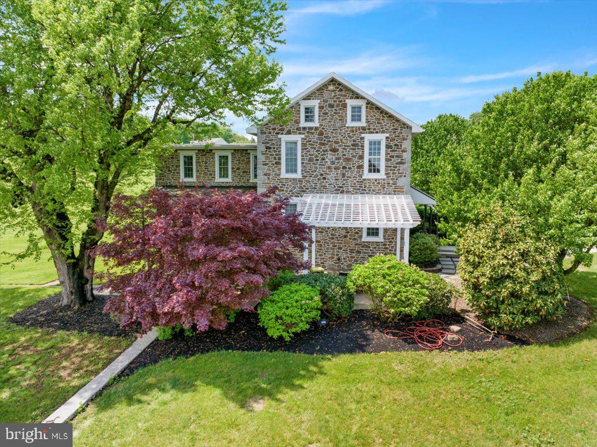 739 Boar Road Mohrsville, PA 19541 - Photo 7 of 98 a front view of a house with a yard