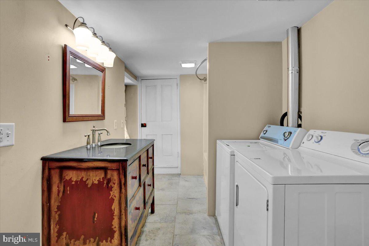 739 Boar Road Mohrsville, PA 19541 - Photo 78 of 98 a bathroom with a sink and a mirror