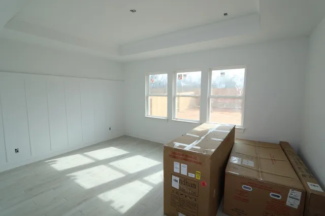 a bathroom with a toilet sink and shower