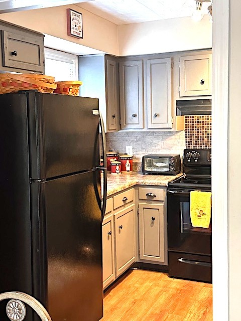 4932 Yorkshire Road Nashville, TN 37211 - Photo 12 of 33 a kitchen with stainless steel appliances granite countertop a refrigerator sink stove and cabinets
