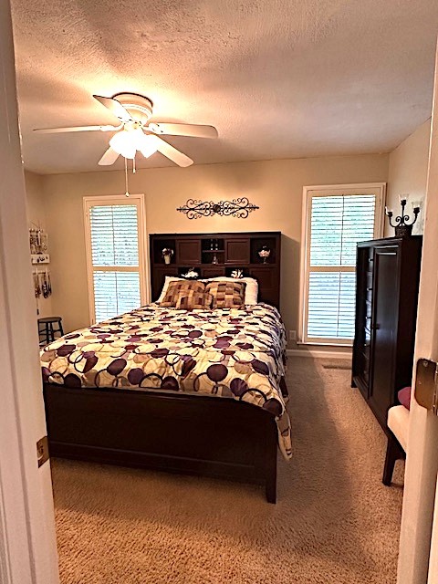 4932 Yorkshire Road Nashville, TN 37211 - Photo 16 of 33 a bed sitting in a bedroom next to a window