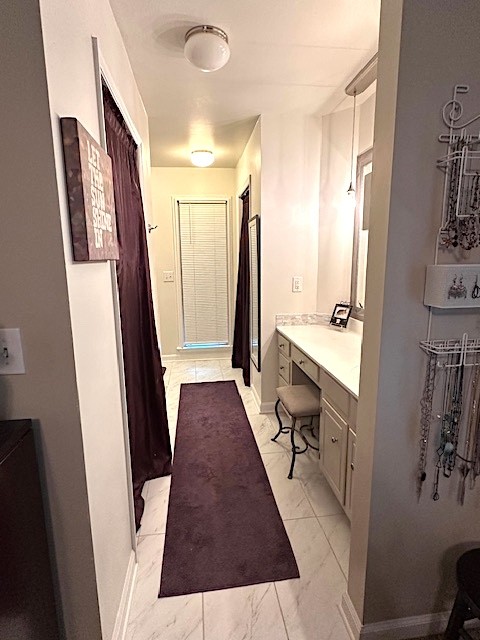 4932 Yorkshire Road Nashville, TN 37211 - Photo 18 of 33 a bathroom with sink a mirror and a shower