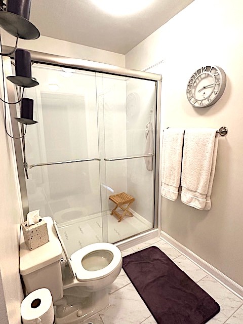 4932 Yorkshire Road Nashville, TN 37211 - Photo 19 of 33 a bathroom with a sink a toilet and a shower