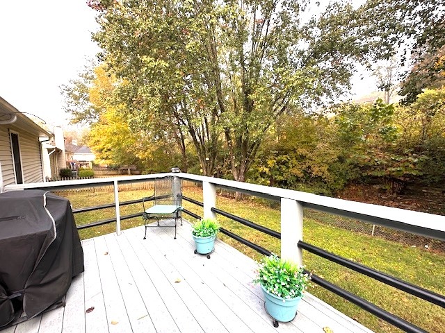 4932 Yorkshire Road Nashville, TN 37211 - Photo 25 of 33 a view of a balcony with floor to ceiling window and wooden floor