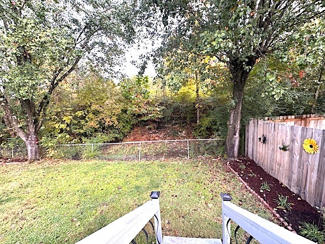 4932 Yorkshire Road Nashville, TN 37211 - Photo 26 of 33 a view of a yard with wooden fence