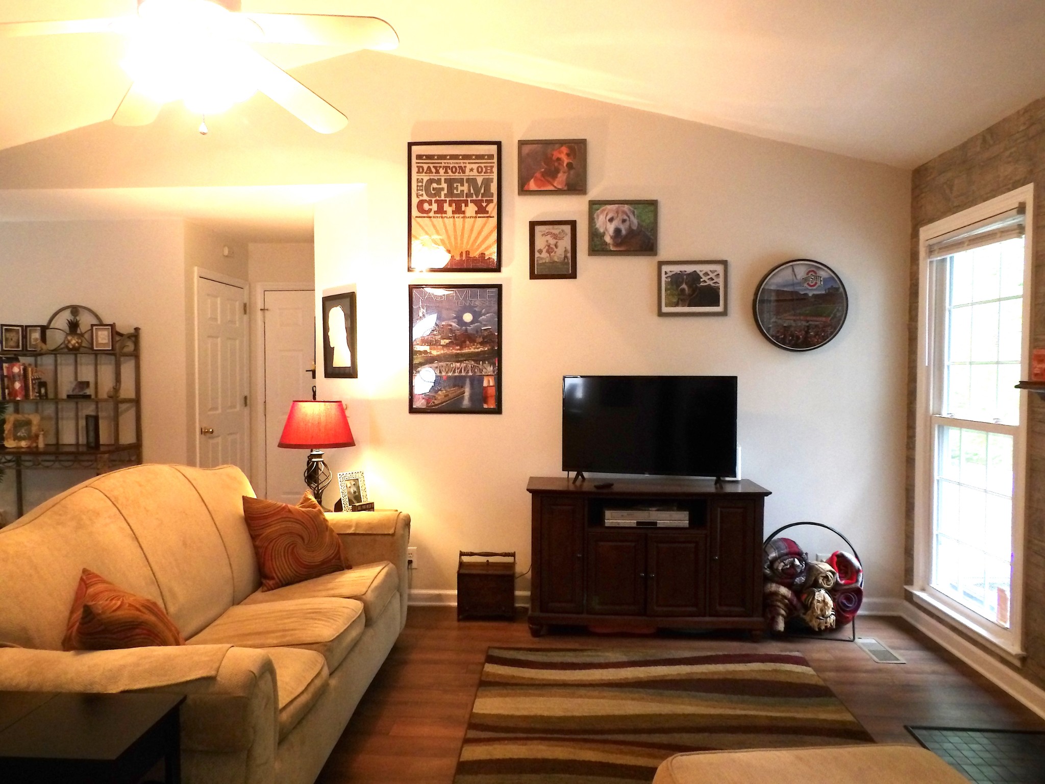 4932 Yorkshire Road Nashville, TN 37211 - Photo 4 of 33 a living room with furniture and a flat screen tv