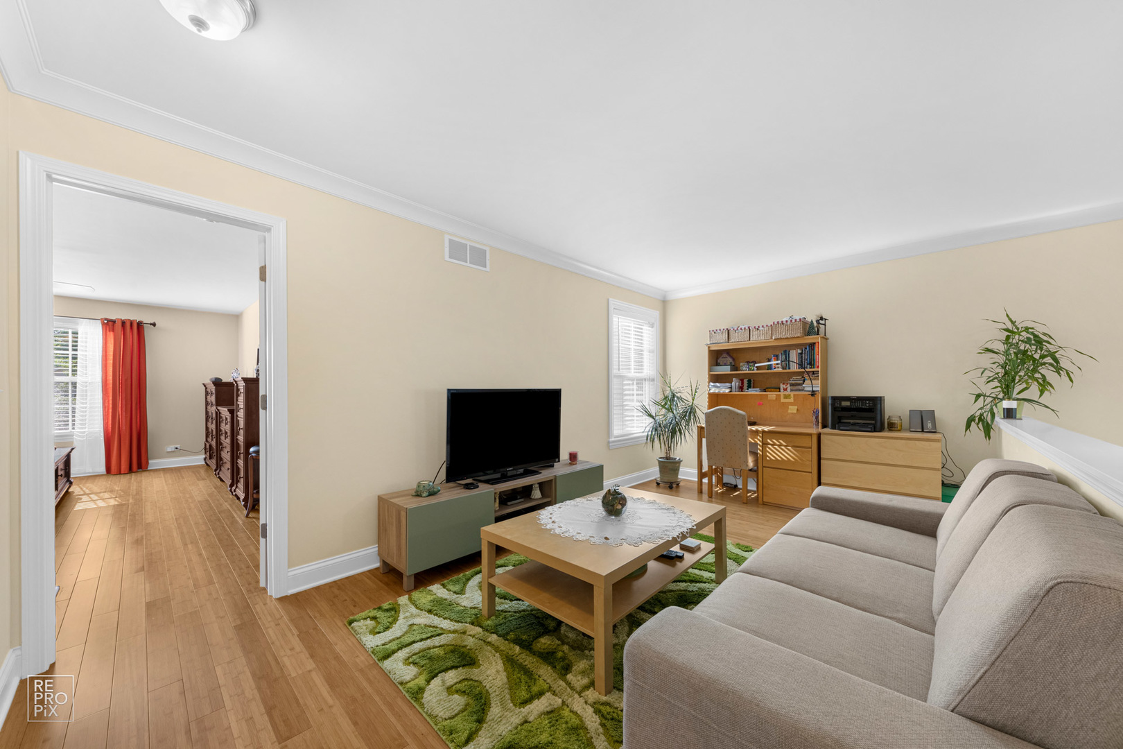 Undisclosed Address Elgin, IL 60120 - Photo 13 of 22 a living room with furniture and a flat screen tv