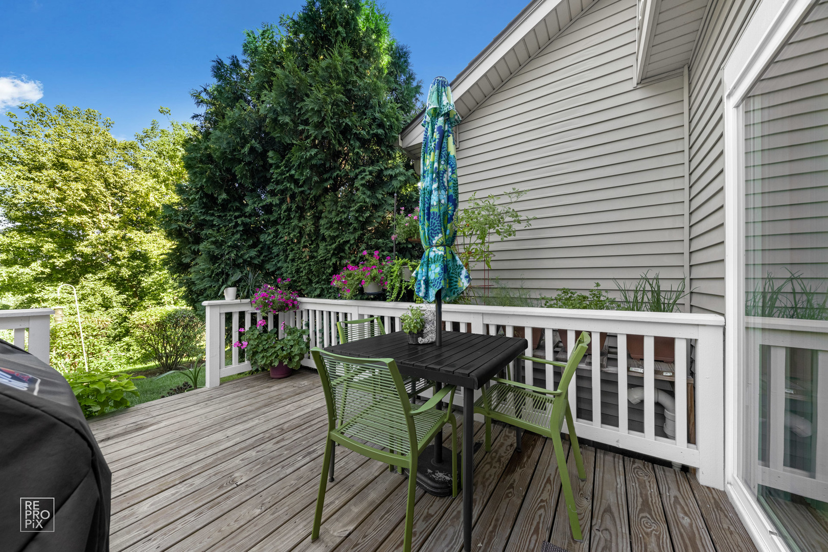 Undisclosed Address Elgin, IL 60120 - Photo 20 of 22 a view of a deck with furniture and wooden deck