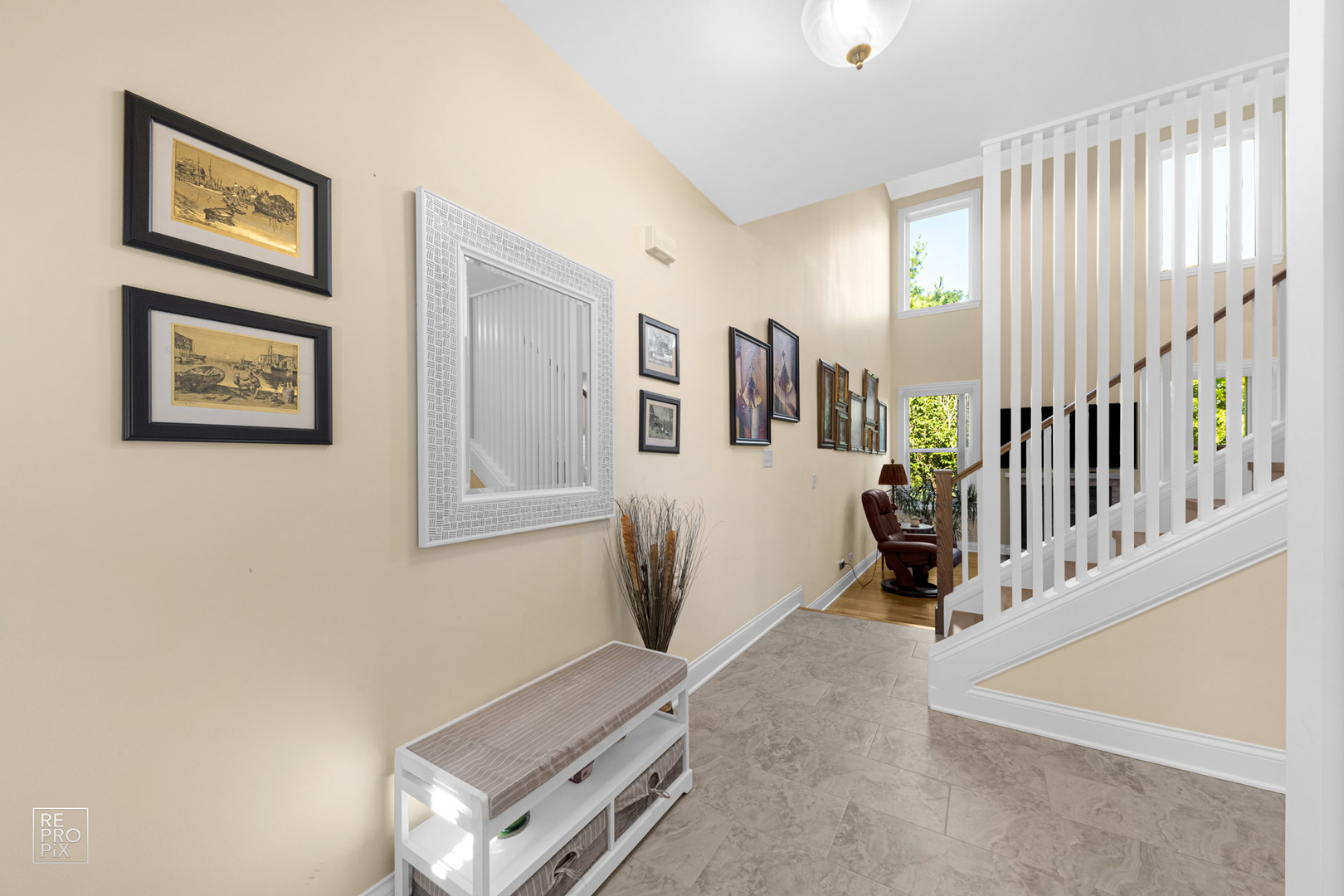 Undisclosed Address Elgin, IL 60120 - Photo 3 of 22 a view of a livingroom with furniture and staircase