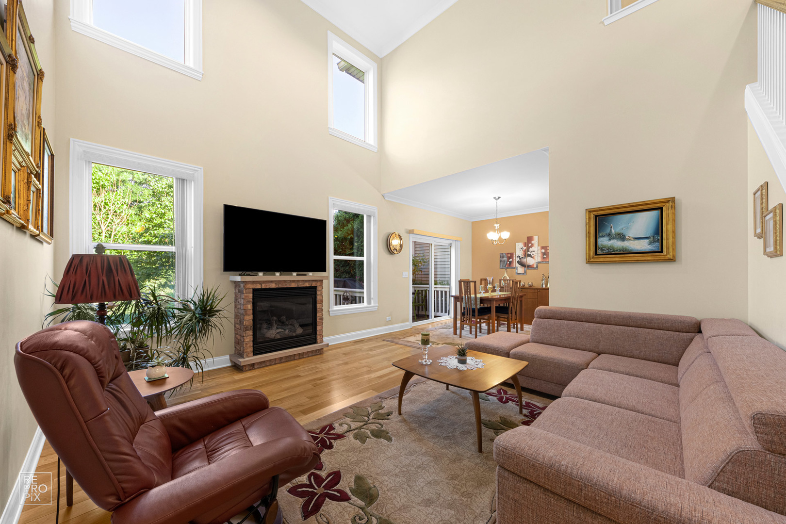 Undisclosed Address Elgin, IL 60120 - Photo 4 of 22 a living room with fireplace furniture and a flat screen tv