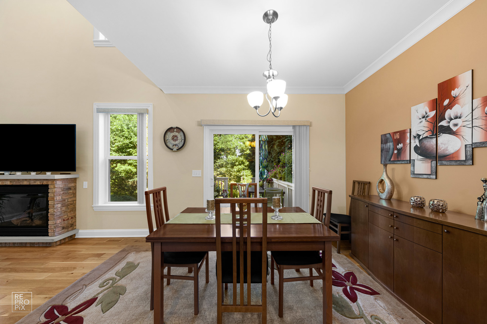 Undisclosed Address Elgin, IL 60120 - Photo 6 of 22 a view of a dining room with furniture window and wooden floor