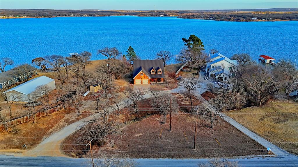 202 Storey Road Nocona, TX 76255 - Photo 18 of 40 a view of a sky from a balcony