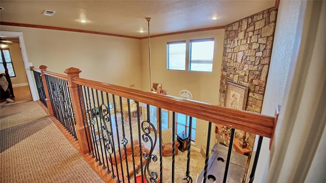 a view of entryway with stairs and wooden floor