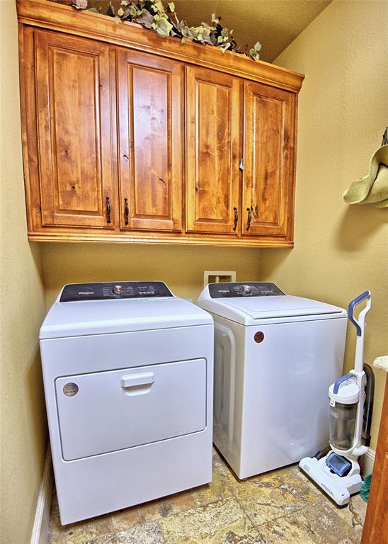 202 Storey Road Nocona, TX 76255 - Photo 35 of 40 a utility room with dryer and washer