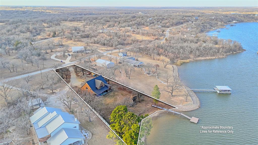 202 Storey Road Nocona, TX 76255 - Photo 40 of 40 an aerial view of a house with outdoor space