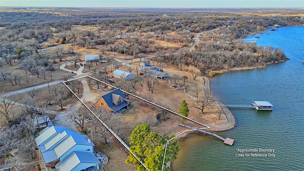 202 Storey Road Nocona, TX 76255 - Photo 5 of 40 an aerial view of a house with outdoor space