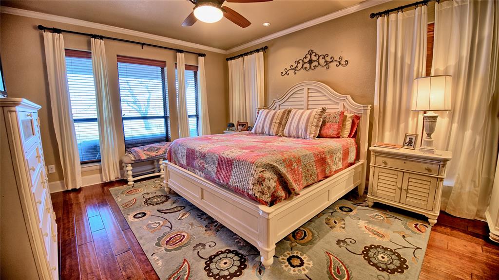 202 Storey Road Nocona, TX 76255 - Photo 8 of 40 a bedroom with a large bed and a window