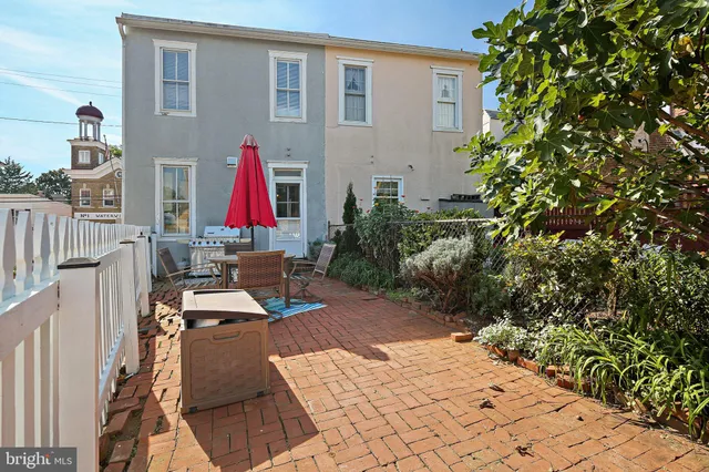 a view of entryway with wooden stairs