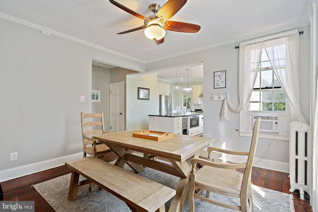 a workspace with furniture and a window