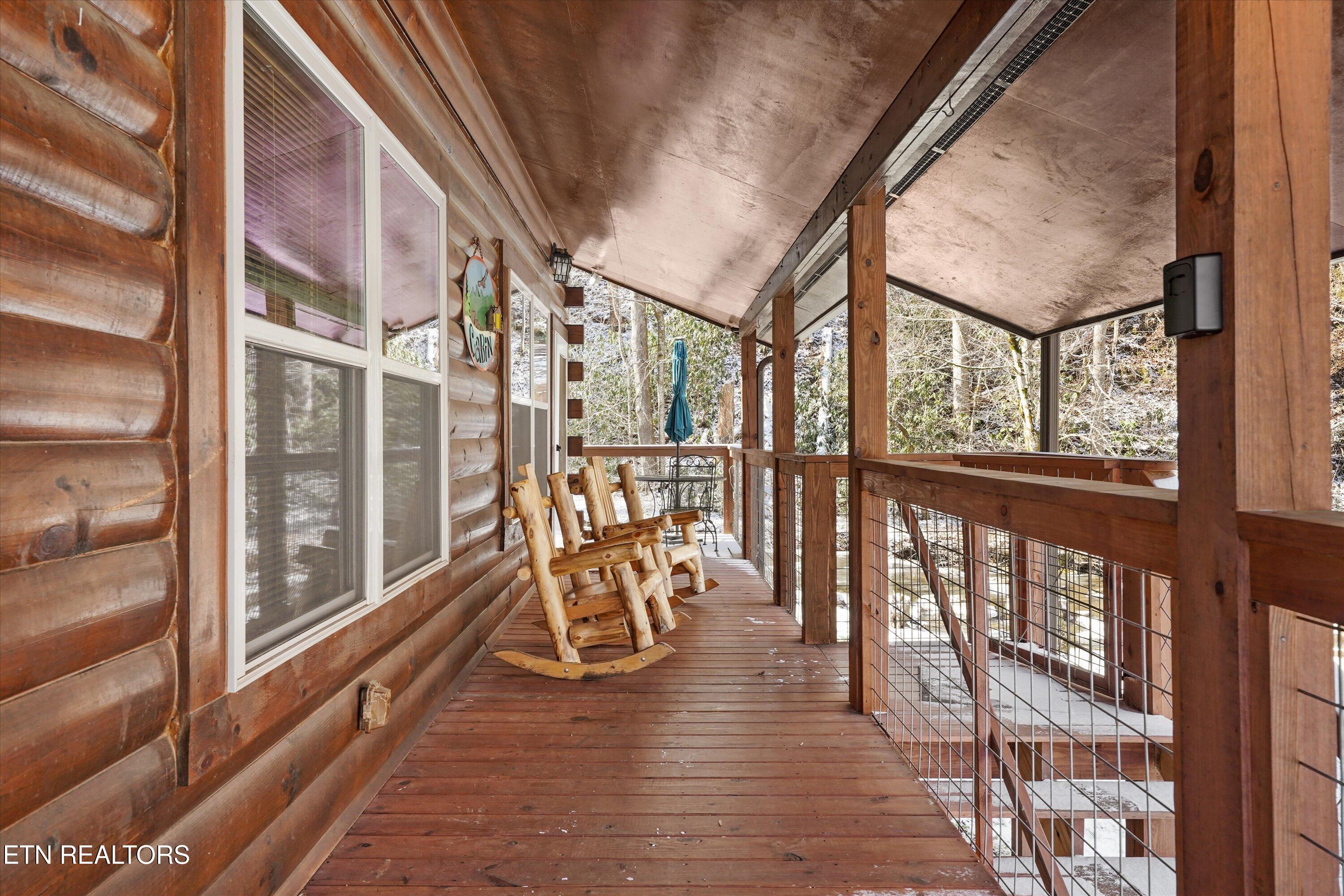 5236 Mathis Branch Road Gatlinburg, TN 37738 - Photo 2 of 50 Expansive Covered Front Porch