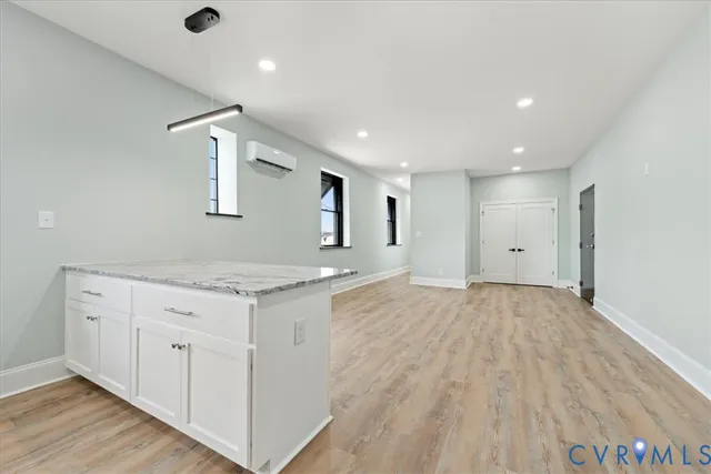 a view of a kitchen with electric appliances