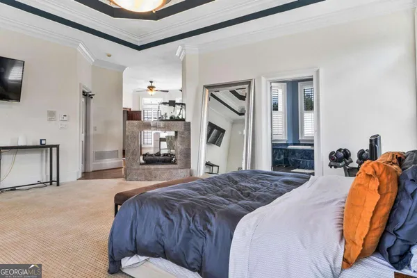 a bedroom with furniture and a couch