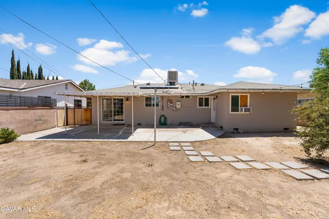 a view of a house with a patio