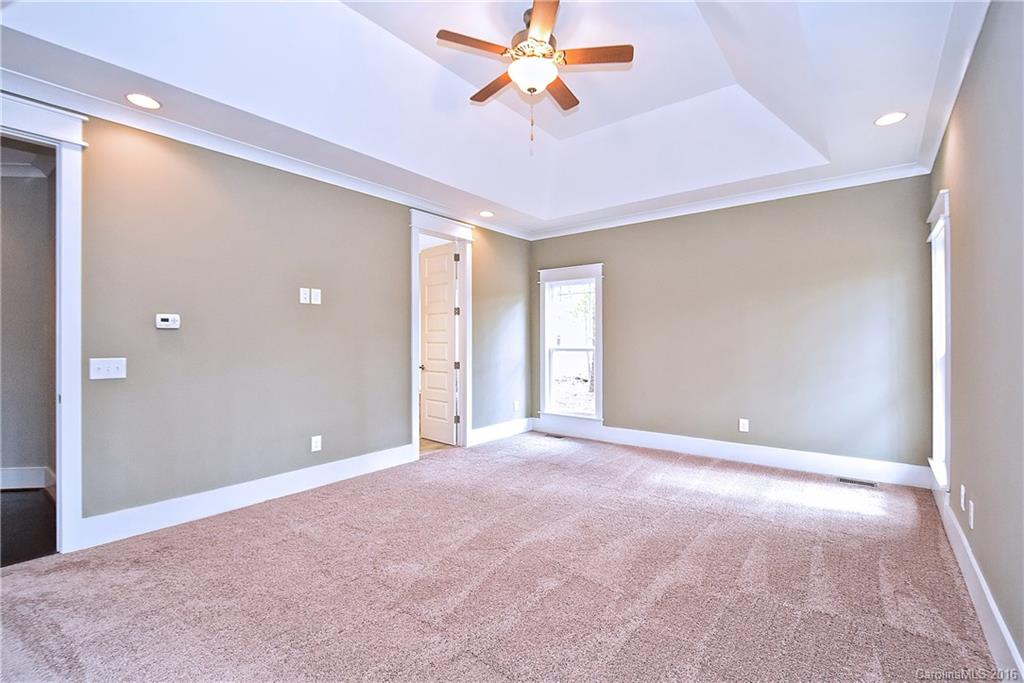 314 McCrary Road Mooresville, NC 28117 - Photo 11 of 20 a view of a room with a ceiling fan and entryway