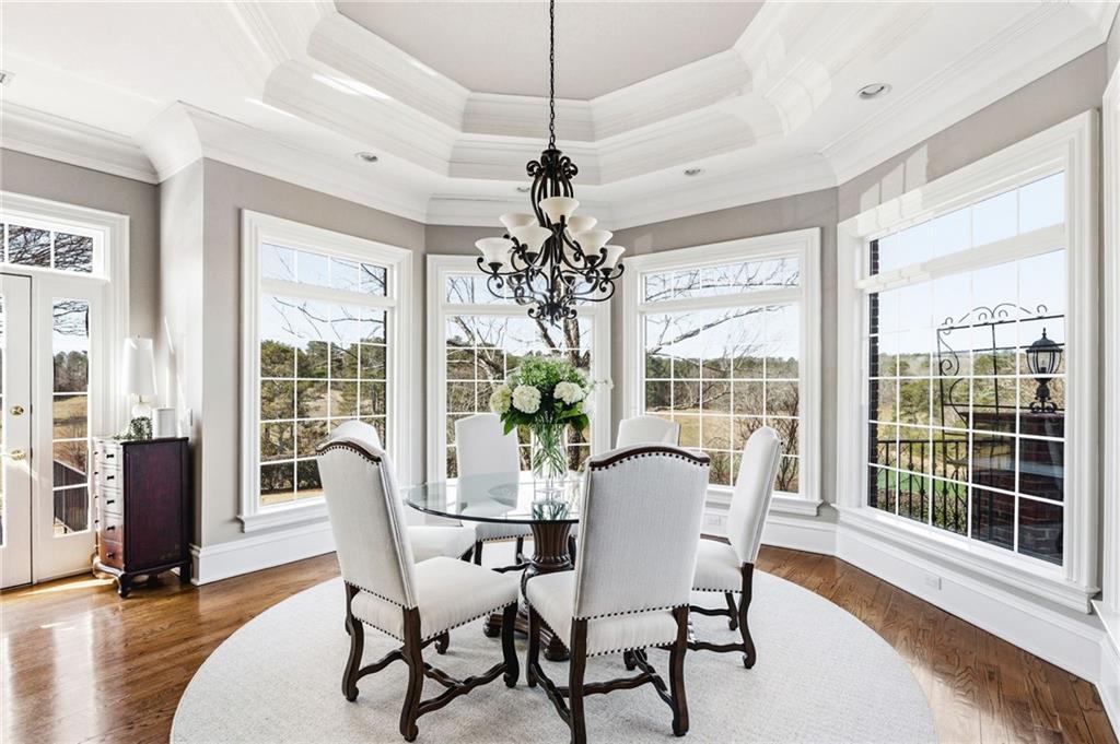 1400 Paul Aiken Road Dallas, GA 30157 - Photo 23 of 62 a dining room with furniture window and wooden floor