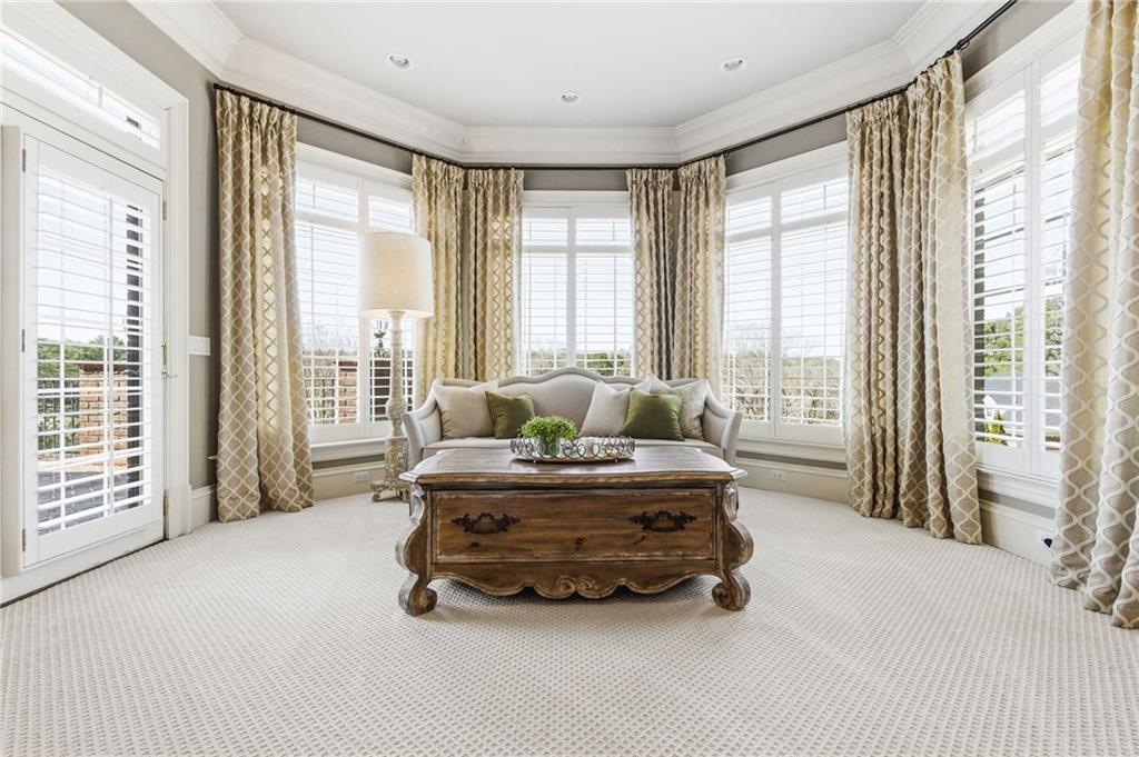 1400 Paul Aiken Road Dallas, GA 30157 - Photo 26 of 62 a spacious bedroom with a bed and glass window