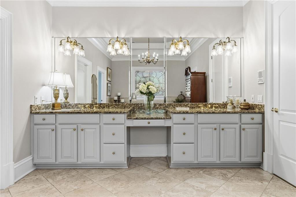 1400 Paul Aiken Road Dallas, GA 30157 - Photo 32 of 62 a bathroom with a double vanity sink and a mirror