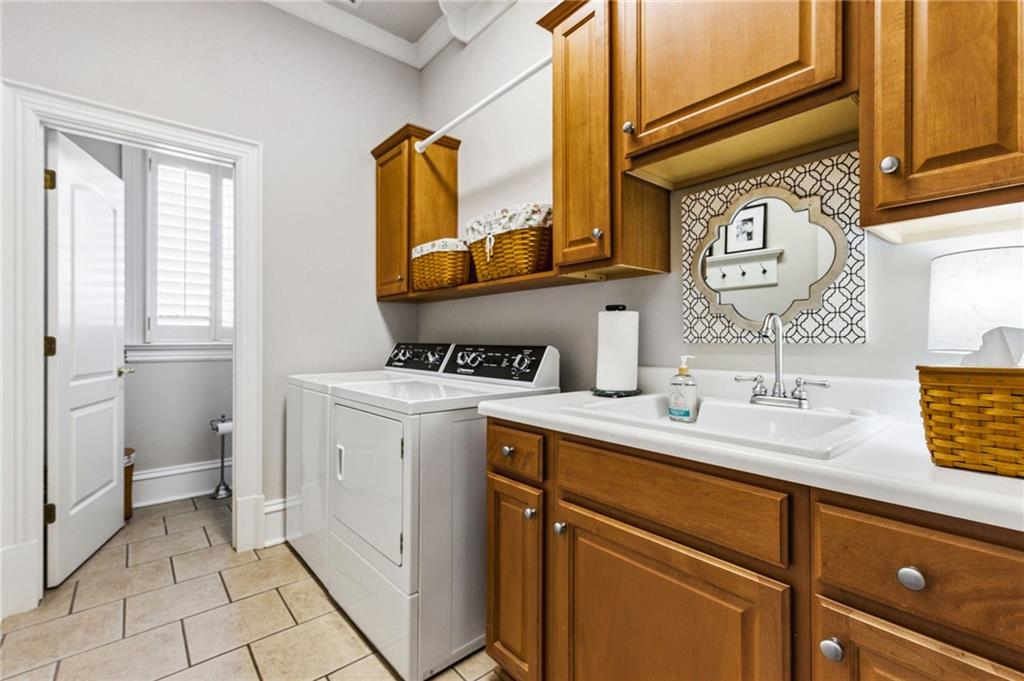 1400 Paul Aiken Road Dallas, GA 30157 - Photo 36 of 62 a kitchen with a sink and a stove top oven