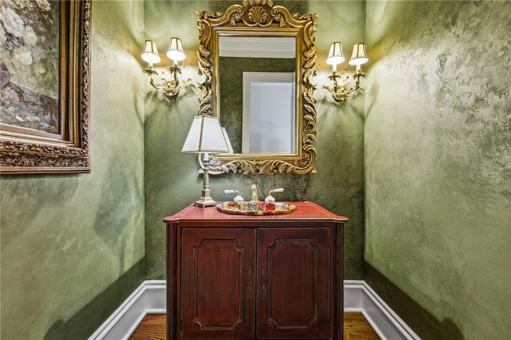 1400 Paul Aiken Road Dallas, GA 30157 - Photo 37 of 62 a bathroom with a sink and a mirror