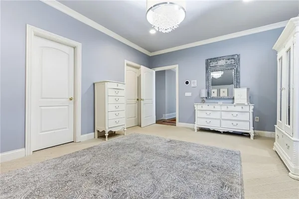 a bathroom with a double vanity sink a mirror and a shower