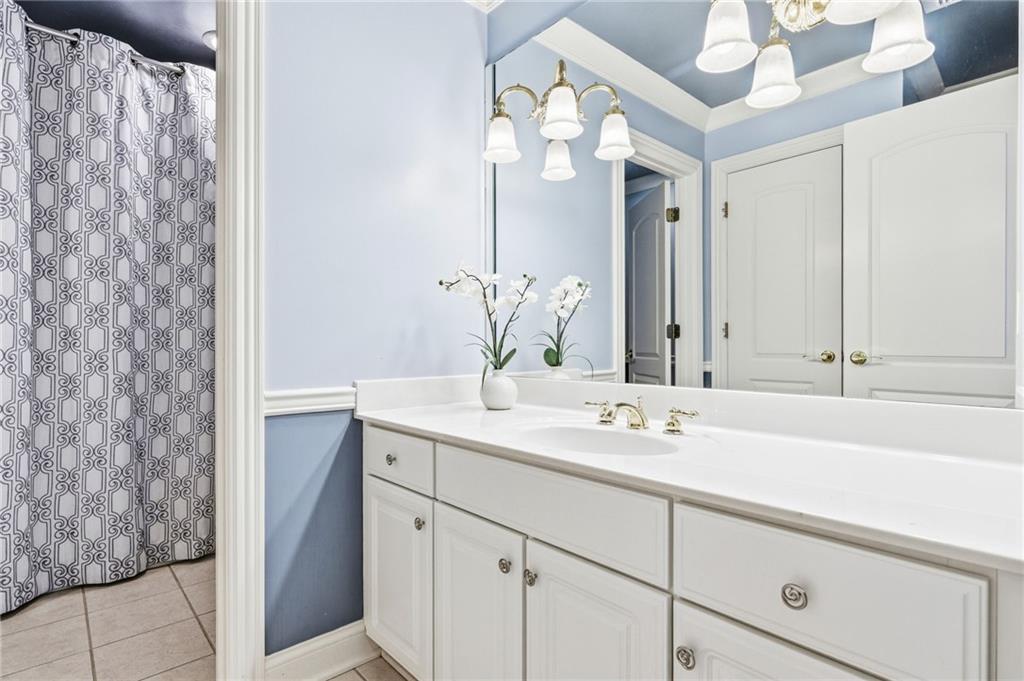 1400 Paul Aiken Road Dallas, GA 30157 - Photo 46 of 62 a bathroom with a sink and a mirror