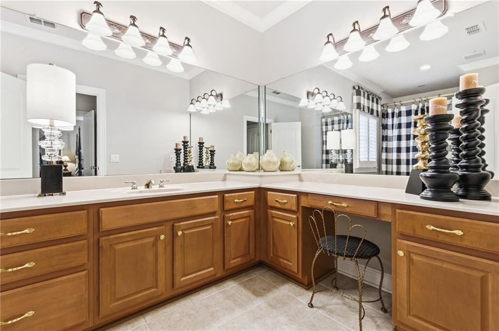 1400 Paul Aiken Road Dallas, GA 30157 - Photo 48 of 62 a spacious bathroom with a sink double vanity and a mirror