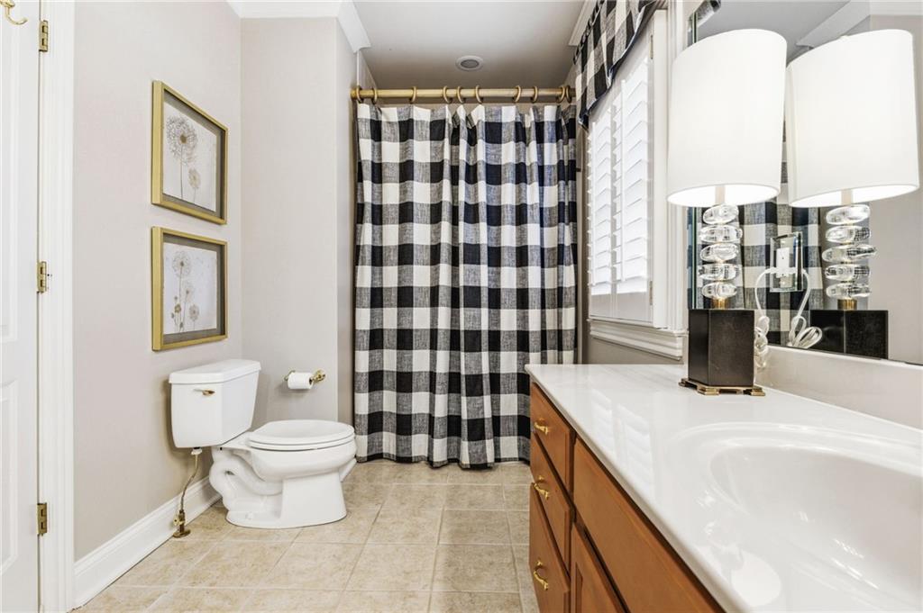 1400 Paul Aiken Road Dallas, GA 30157 - Photo 49 of 62 a bathroom with a sink toilet and shower