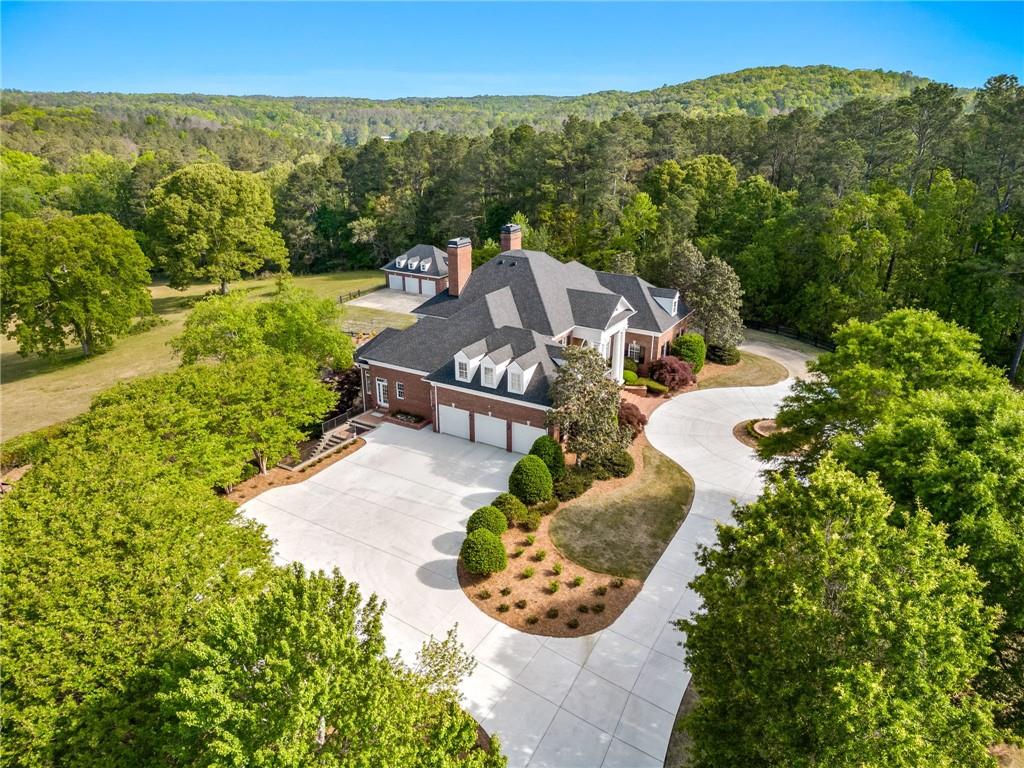 1400 Paul Aiken Road Dallas, GA 30157 - Photo 5 of 62 a view of a garden with a patio