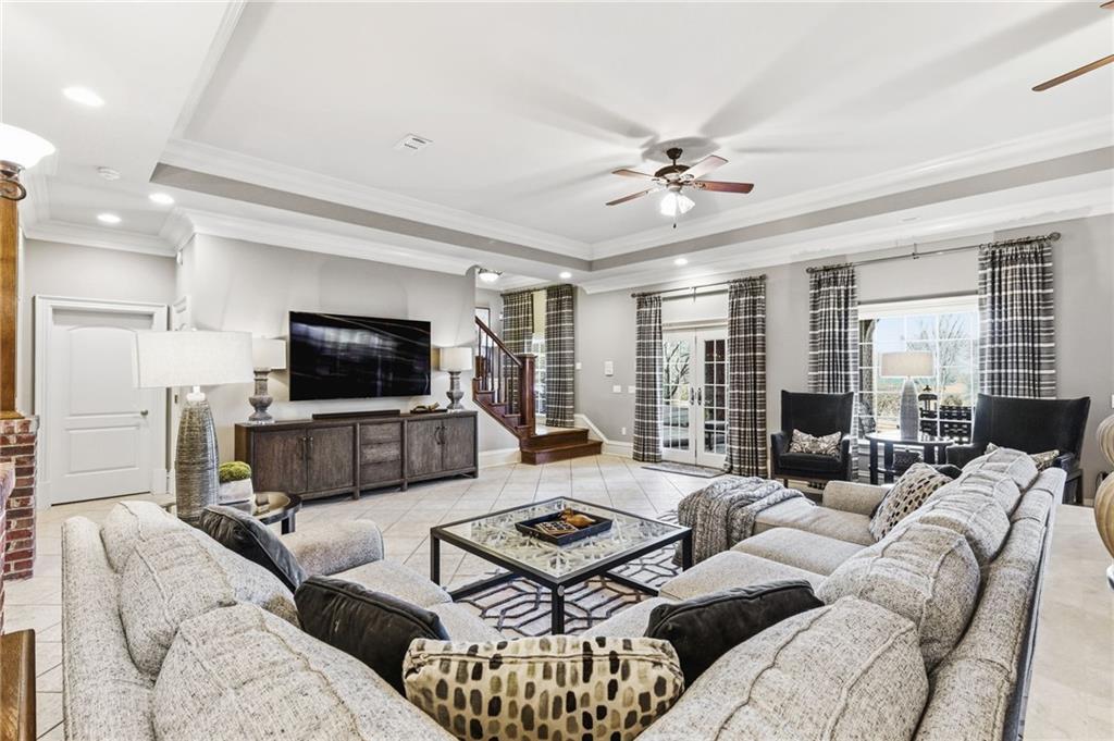 1400 Paul Aiken Road Dallas, GA 30157 - Photo 51 of 62 a living room with furniture a flat screen tv and a large window