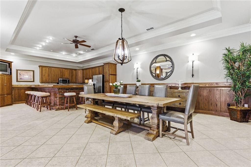 1400 Paul Aiken Road Dallas, GA 30157 - Photo 53 of 62 a living room with furniture a clock and a chandelier