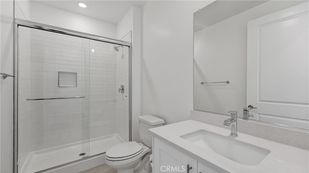 107 Pansy Irvine, CA 92618 - Photo 16 of 35 a bathroom with a sink toilet and shower