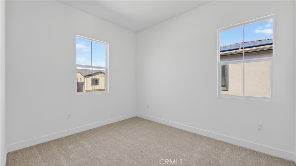 107 Pansy Irvine, CA 92618 - Photo 18 of 35 an empty room with windows