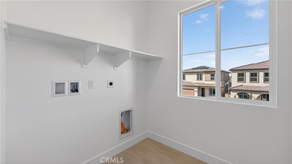 107 Pansy Irvine, CA 92618 - Photo 19 of 35 a view of storage and utility room with a window