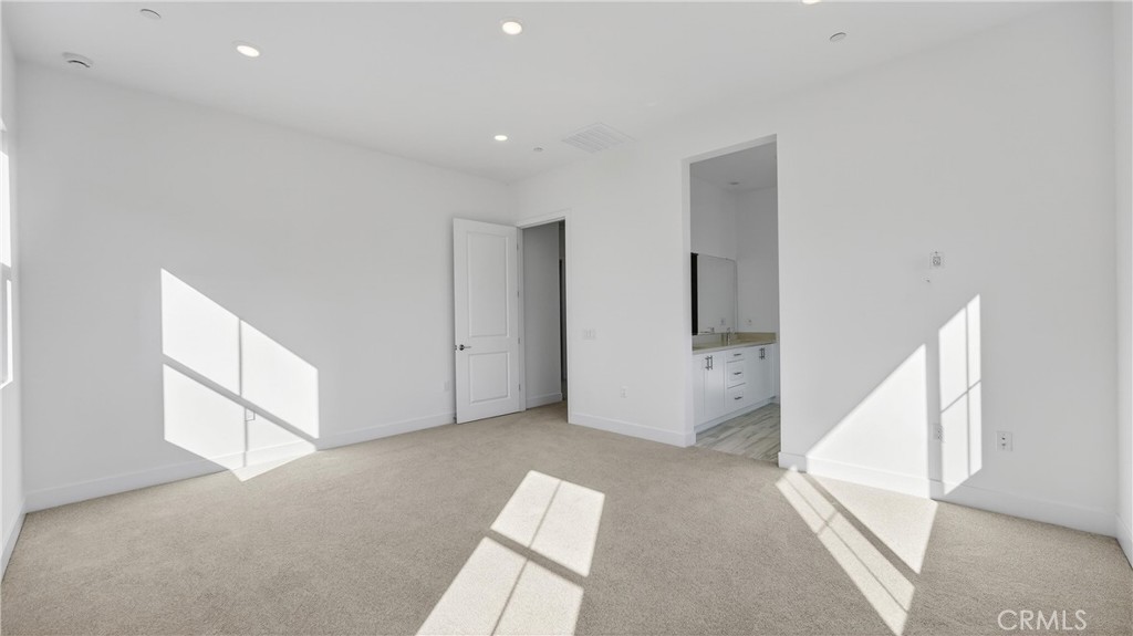 107 Pansy Irvine, CA 92618 - Photo 23 of 35 a view of an empty room with wooden floor